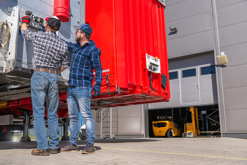 workers inspecing industrial generator